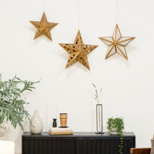 Paper star lanterns hanging in a living room