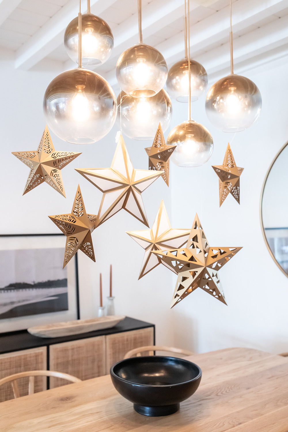 Paper star lanterns hanging in a dining room