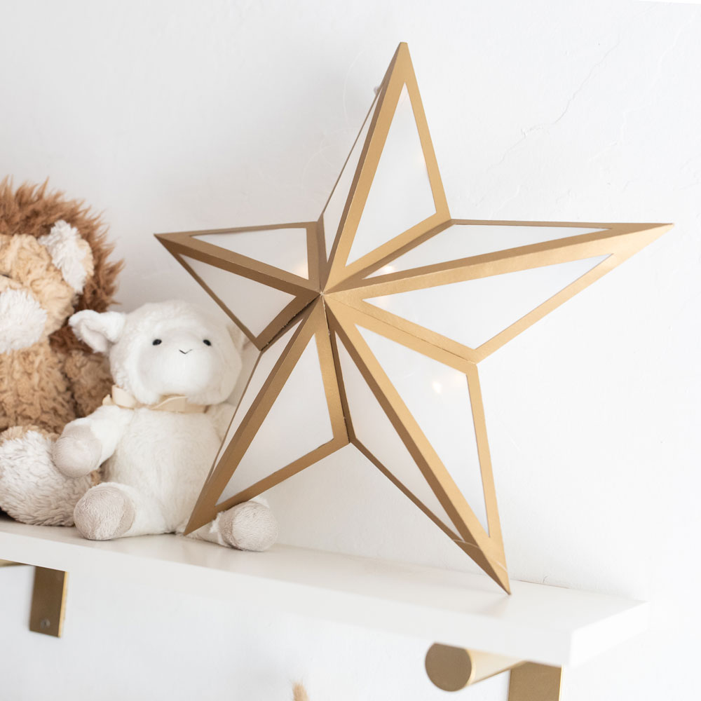 Paper star lantern sitting on shelf