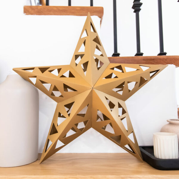 Paper star lantern sitting on shelf