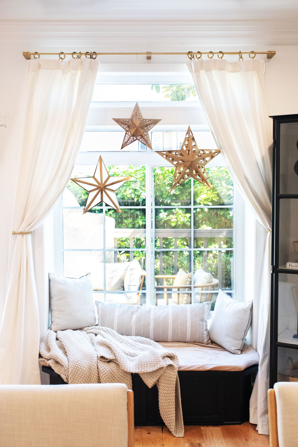 Paper star lanterns hanging in a window