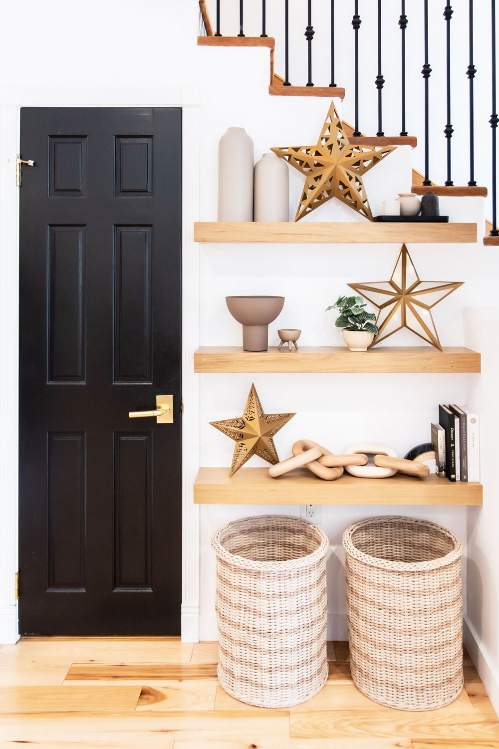 Paper star lanterns sitting on shelf