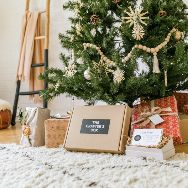The Crafter's Box gift under a Christmas tree.